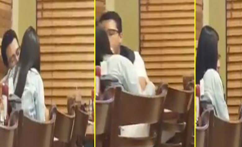 Mujer masturba a su pareja en pleno restaurante [VIDEO]