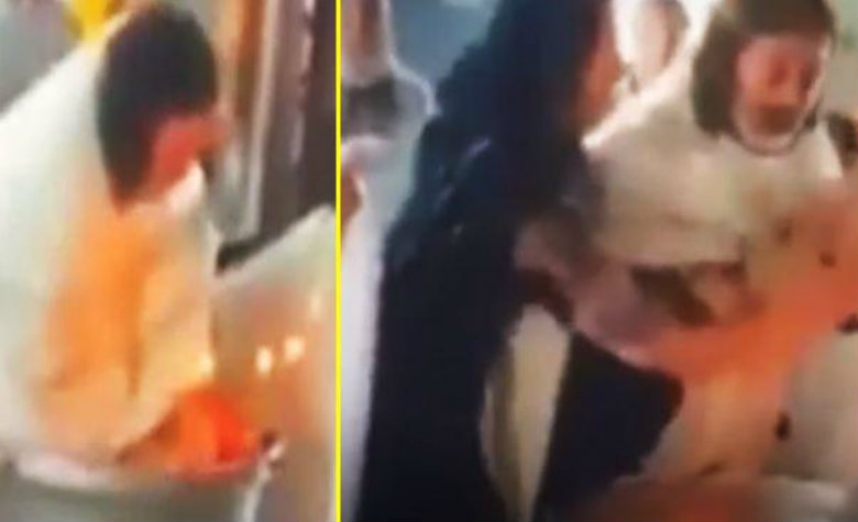 Sacerdote intenta asfixiar a un bebé en su bautizo [VIDEO]