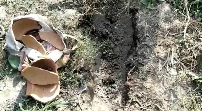Hombre cava tumba para su bebé y encuentra a una recién nacida enterrada viva