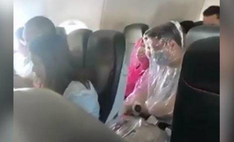 Pareja se envuelve en plástico durante vuelo por miedo a coronavirus [VIDEO]