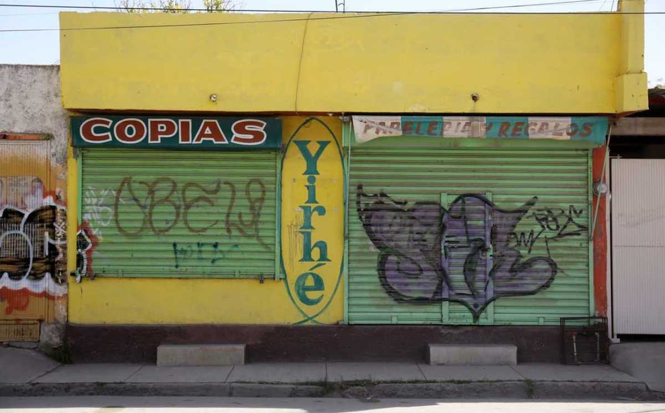 Graffiti invade comercios y viviendas en bulevar Miguel Alemán en Lerdo