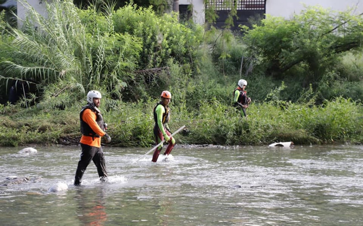Reanudan búsqueda de mujer arrastrada por corriente en el río La Silla