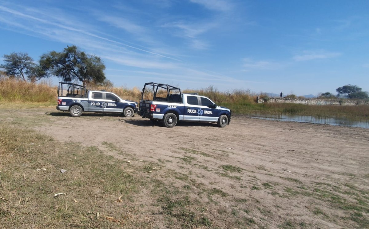Unidades de la policía de Tlajomulco en la presa de Los Cántaros / Juan Carlos Munguía