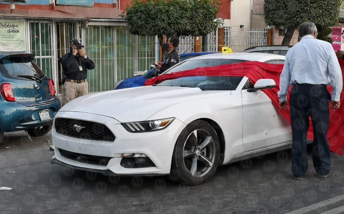 Mustang en el que viajaban las víctimas / Jorge Becerril.