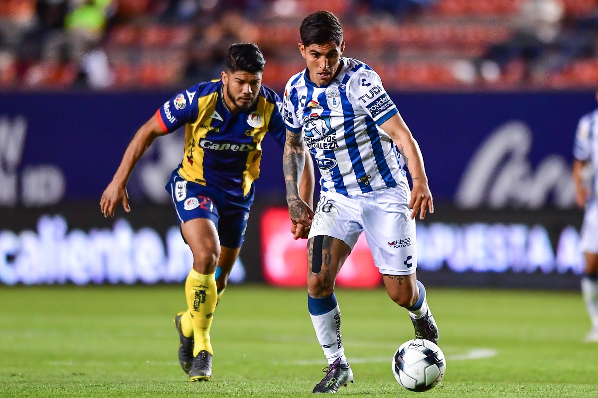 Jair Díaz, de San Luis, y Víctor Guzmán, de Pachuca / Mexsport
