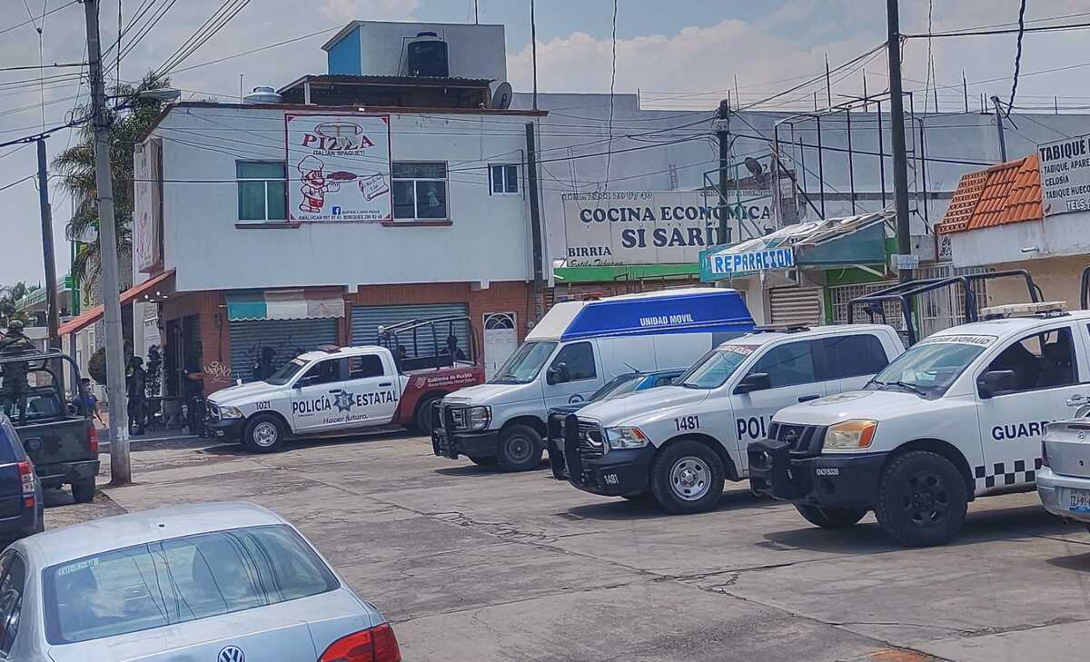Escena del crimen en mercado de Bosques de San Sebastián, Puebla / Jesús Zavala