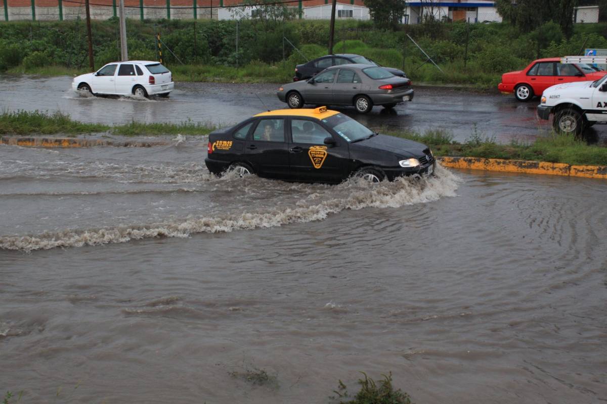 En la ciudad de Puebla se registran inundaciones y encharcamientos / Andrés Lobato