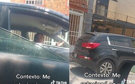 Mujer reclama a conductora por estacionarse en parque público.