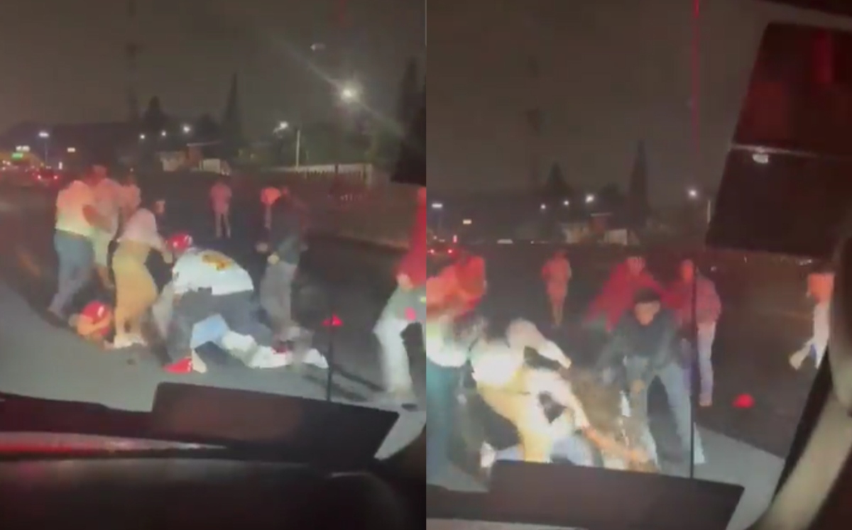 Personas peleando sobre la autopiusta México - Puebla | Twitter: @cesargutipri