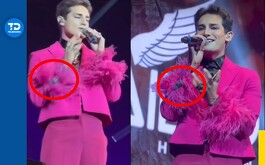 Emilio Osorio usando traje con tag de seguridad