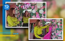 una mujer se prueba un vestido en un espejo