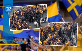 Aficionados de Tigres pelean con la policía en las afueras del Estadio Universitario