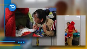 una mujer atiende a un bebé