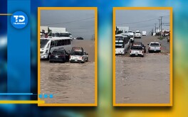 Policías lograron sacar de entre el agua la camioneta de la mujer en colonia Nueva Imagen.