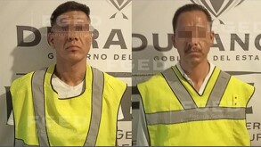 Eduardo y Juan Felipe, guardias de seguridad en el bar 