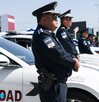 policías municipales al lado de sus patrullas policías municipales al lado de sus patrullas