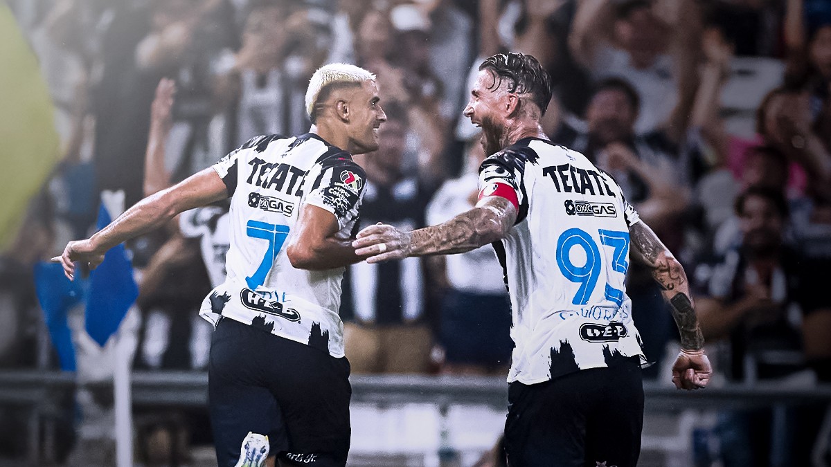 Berterame y Sergio Ramos festejando una anotación con Rayados.