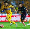 El equipo de Tigres, comandados por Guido Pizarro se dieron gozo al golear al Puebla en el regreso a la Liga MX. El equipo de Tigres, comandados por Guido Pizarro se dieron gozo al golear al Puebla en el regreso a la Liga MX.