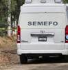 vehículo del servicio médico forense en un camino vehículo del servicio médico forense en un camino