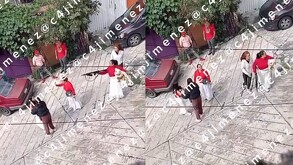 ¡Con bebé en brazos! Mujer amenaza con un arma de fuego a sus vecinos tras pelea callejera en Naucalpan.