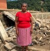 Señora damnificada junto a su vivienda destruida por las inundaciones en Huautla, Hidalgo. Señora damnificada junto a su vivienda destruida por las inundaciones en Huautla, Hidalgo.