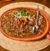 Imagen ilustrativa de un platillo típico de carne en su juego en el restaurante Kamilos 333 en Guadalajara Imagen ilustrativa de un platillo típico de carne en su juego en el restaurante Kamilos 333 en Guadalajara