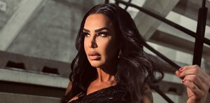En la foto aparece Lis Vega con un atuendo en negro con brillos. En la foto aparece Lis Vega con un atuendo en negro con brillos.