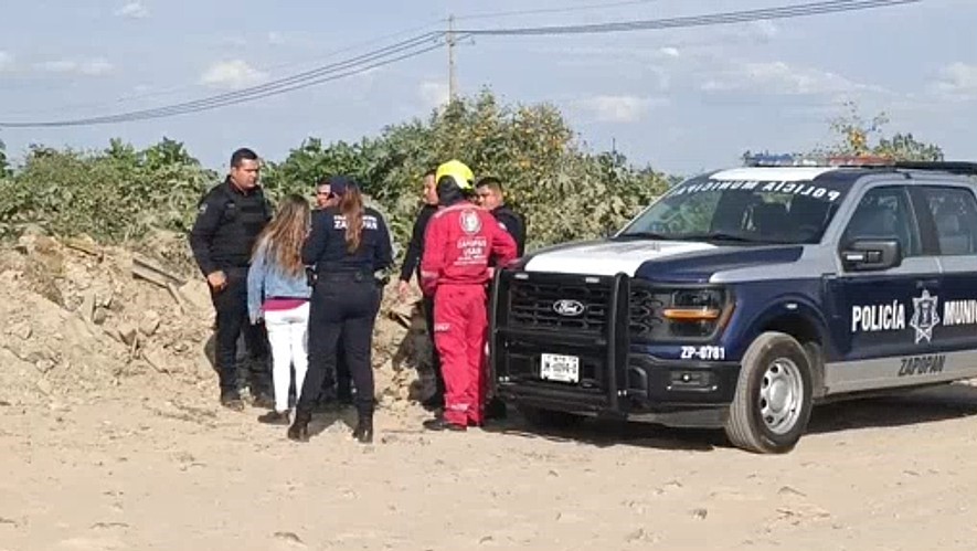 Elementos de la Policía de Zapopan y Protección Civil y Bomberos en el lugar donde fue encontrado el cuerpo Elementos de la Policía de Zapopan y Protección Civil y Bomberos en el lugar donde fue encontrado el cuerpo