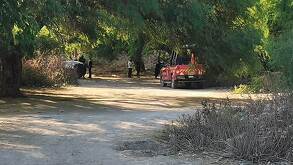 patrulla de policía en un camino de terracería en puebla