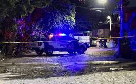 Zona de Las Juntas en Tlaquepaque con una cinta de advertencia amarilla y una patrulla de la policía de Tlaquepaque en el fondo