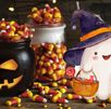 Dulces de Halloween y fantasmita disfrazado con dulces. Dulces de Halloween y fantasmita disfrazado con dulces.