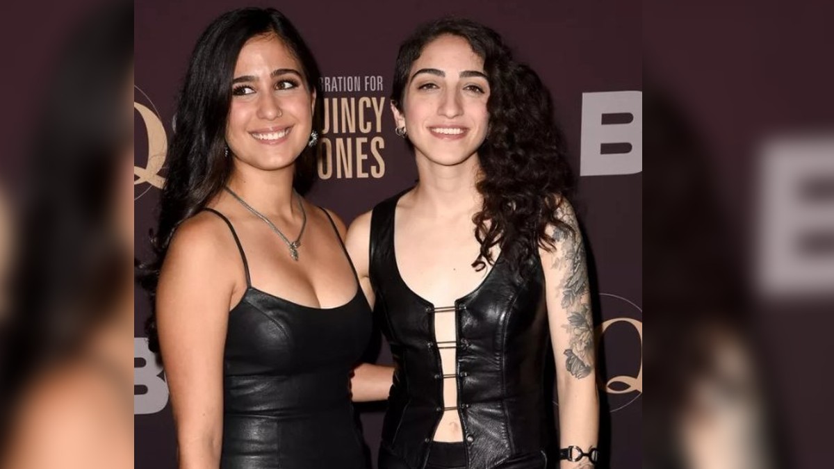 Emily Estefan posando junto a su novia Gemeny Hernández en una alfombra roja. Emily Estefan posando junto a su novia Gemeny Hernández en una alfombra roja.