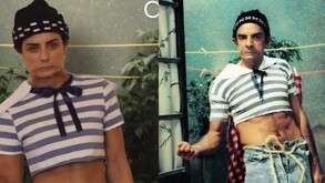 Aislinn Derbez con un gorro negro, short de mezclill y camisa rallada haciendo muecas y a un lado Eugenio Derbez con el mismo atuendo.