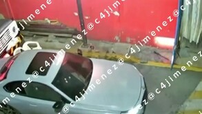 Asesinato de presunto sicario a interior de auto BMW en Iztapalapa