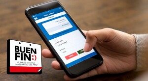 Mano sosteniendo un teléfono celular con una aplicación bancaria abierta y una mesa de madera de fondo. El logo del Buen Fin en la esquina inferior inzquierda