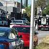 Policías resguardando casa por homicidio en Guadalupe.