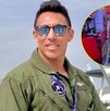 Joven con lentes y vestido de piloto al lado de una avioneta
