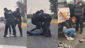 Policías de Guadalupe deteniendo a una motociclista