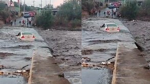 Auto en medio del río Pesquería.