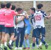 Jugadores de Rayados Sub-17 festejando un triunfo con su entrenador Alex Pruna Zafra en El Barrial.