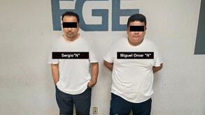 Dos hombres (identificados como Sergio 
