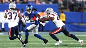 Los Giants vs Patriots durante un partido de NFL.