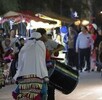Imagen de Milenio en donde se observan danzantes en peregrinación nocturna de Torreón.