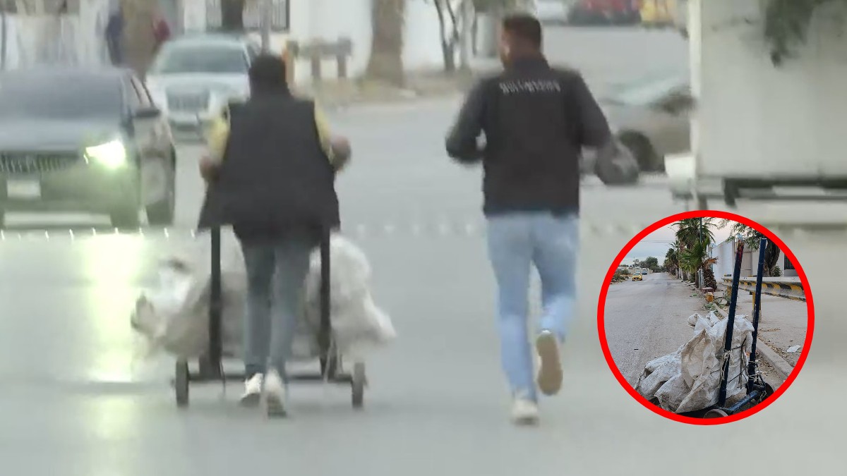 Reportero persiguiendo a un hombre que se llevaba desechos de un terreno baldío.