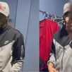 Joven con chamarra nike, gorra y pañoleta sobre el rostro sosteniendo un arma de fuego al lado de un perchero con ropa