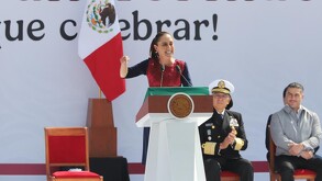 Claudia Sheinbaum dando un mensaje durante el festejo de los siete años de la Cuarta Transformación.