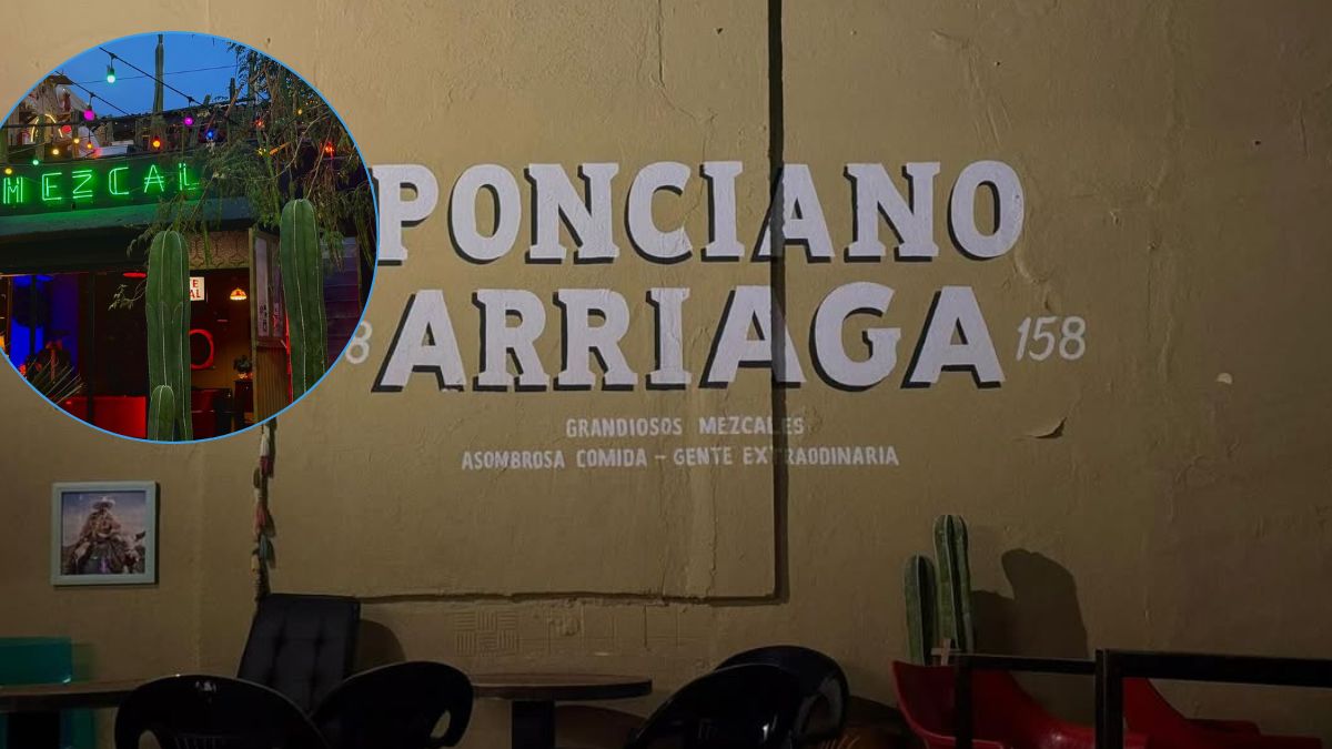 Bar Ponciano por dentro, con una pared pintada y gente en su exterior.