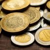Monedas  nacionales de México de diferentes valores principalmente de 10 pesos.