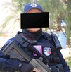 Mujer con uniforme de la Policía Municipal de Culiacán