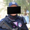 Mujer con uniforme de la Policía Municipal de Culiacán